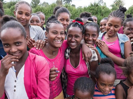Young Ethiopian girls laughing and smiling
