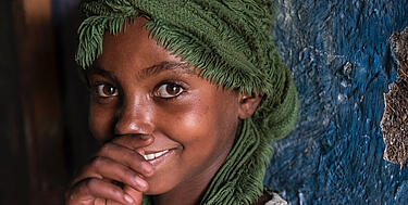 Besišypsanti Etiopijos mergaitė